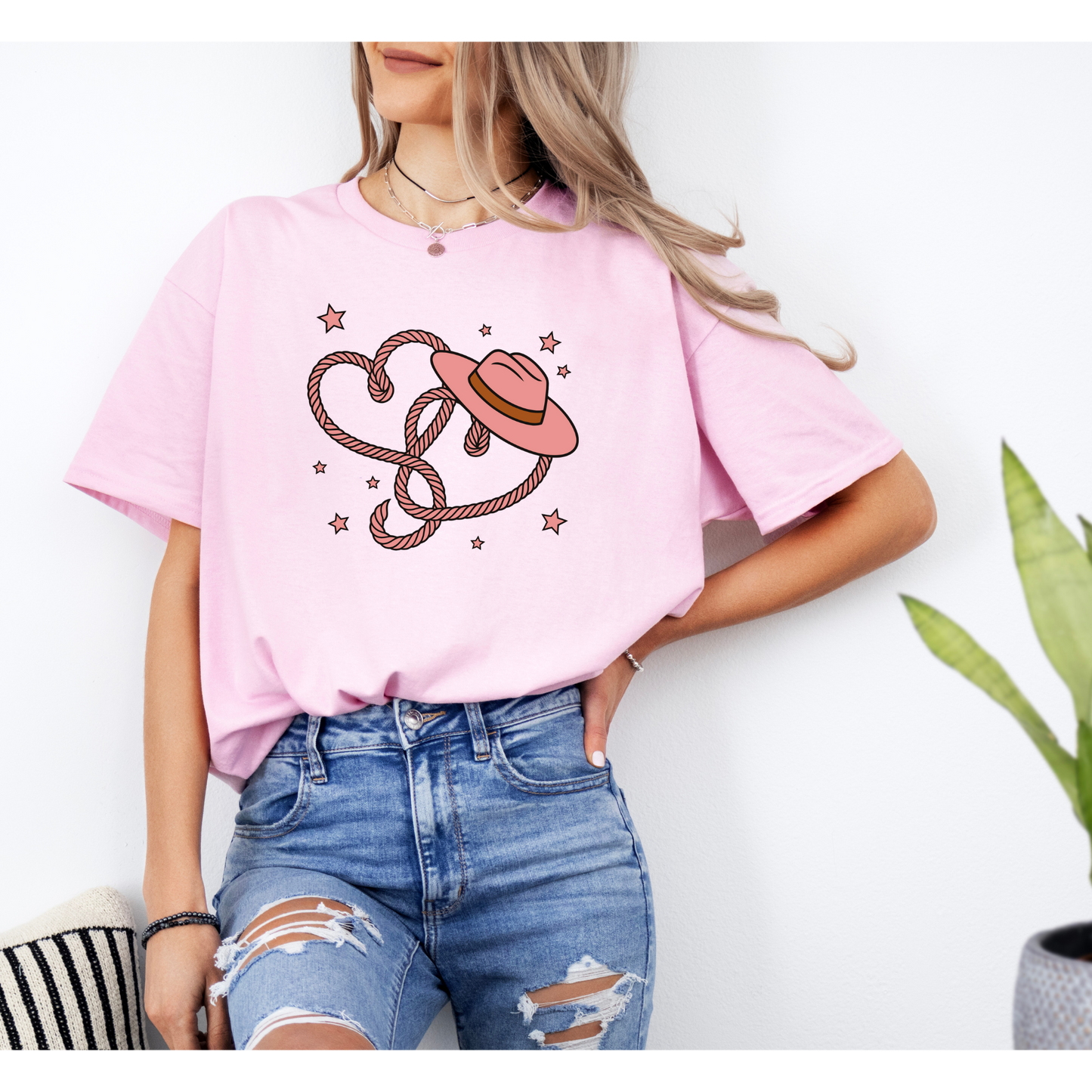Heart in Ropes with Cowboy hat shirt | Hearts | Cowgirl Hat | Colors Black , Light Pink , Sand , White | Sizes Small to 4 X large