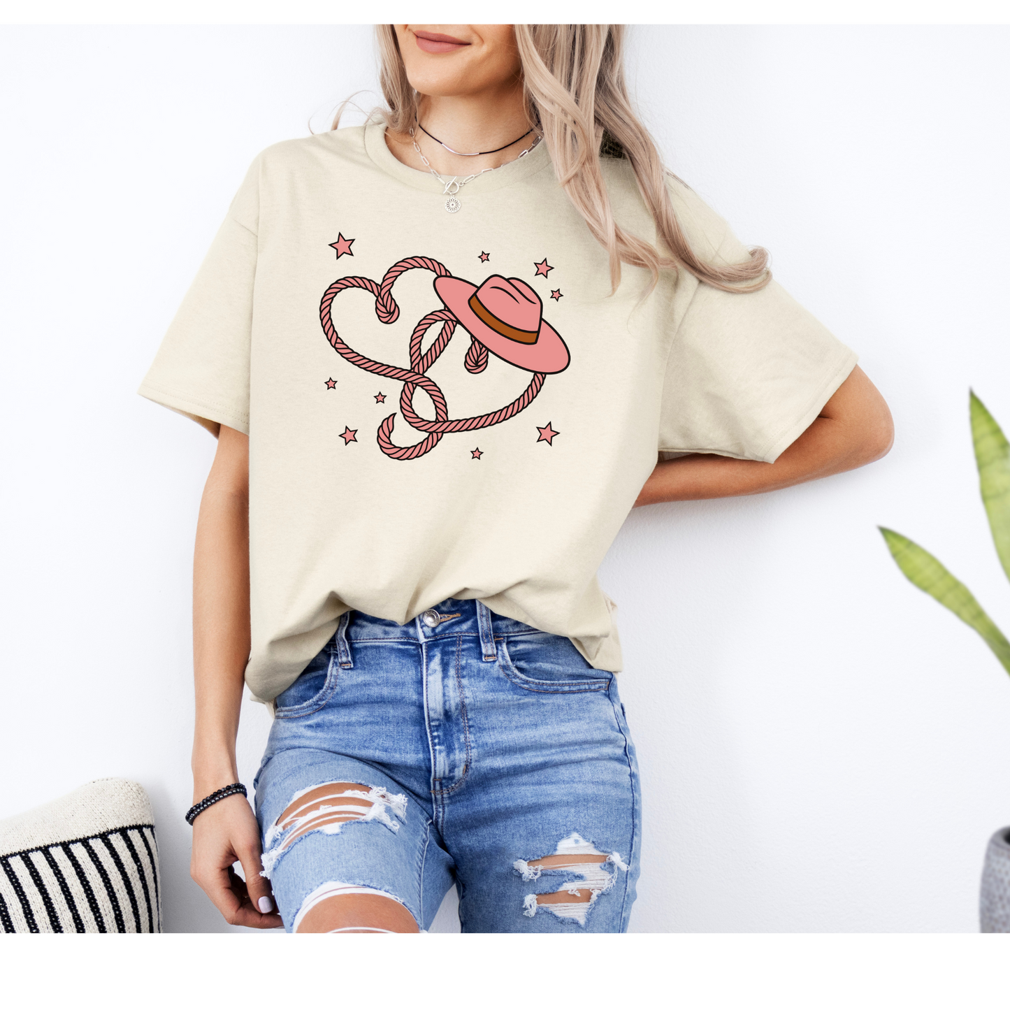 Heart in Ropes with Cowboy hat shirt | Hearts | Cowgirl Hat | Colors Black , Light Pink , Sand , White | Sizes Small to 4 X large